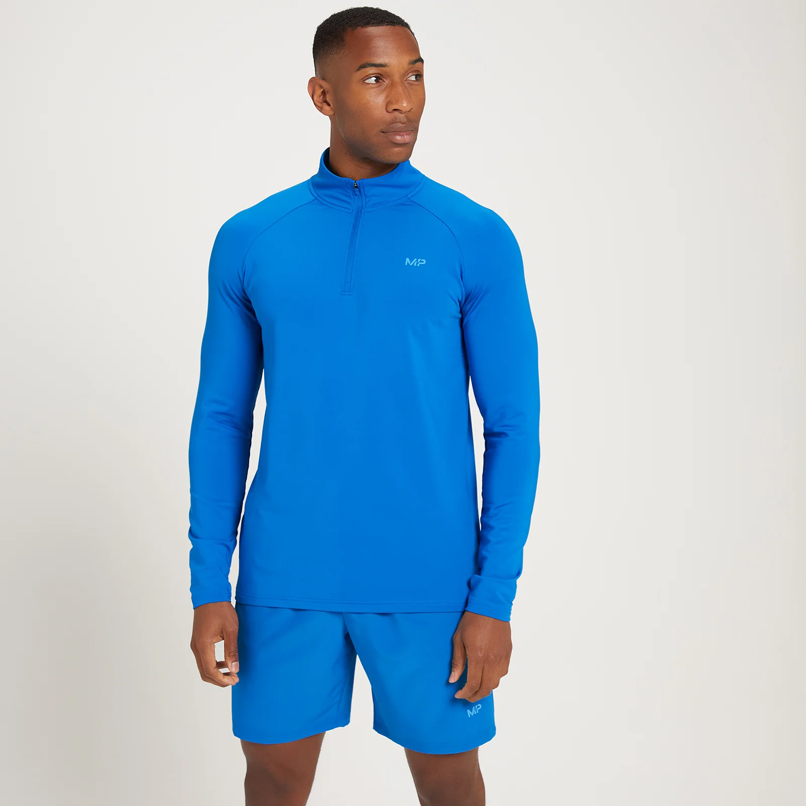 MP Men's Linear Mark Graphic Training 1/4 Zip - True Blue - XXS الصورة 1